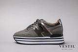 Hogan, sports shoe, toupe, woman